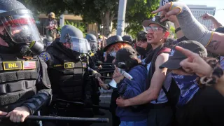 Trump vows to 'HIT' any protester who spits on police. He pardoned those who did far worse on Jan. 6