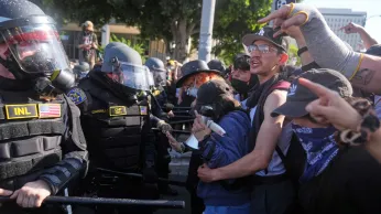 Trump vows to 'HIT' any protester who spits on police. He pardoned those who did far worse on Jan. 6