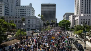 The Latest: Protests over immigration raids spread across the US