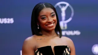 Simone Biles apologizes for heated exchange with Riley Gaines over trans athlete participation