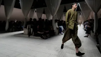 Armani's global aesthetic shines in bohemian Emporio Armani show, though designer misses Milan bow