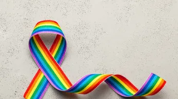 Landmark Study and Funding Cuts Shape the Future of HIV/AIDS Care in LGBTQ+ Communities