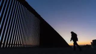 Judge blocks order barring asylum access at border and gives administration two weeks to appeal